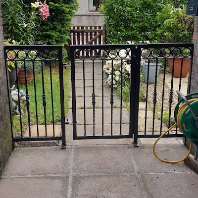 Galvanised the powder coated black garden gate with matching fence panels in Silloth Cumbria | Glenview Steel